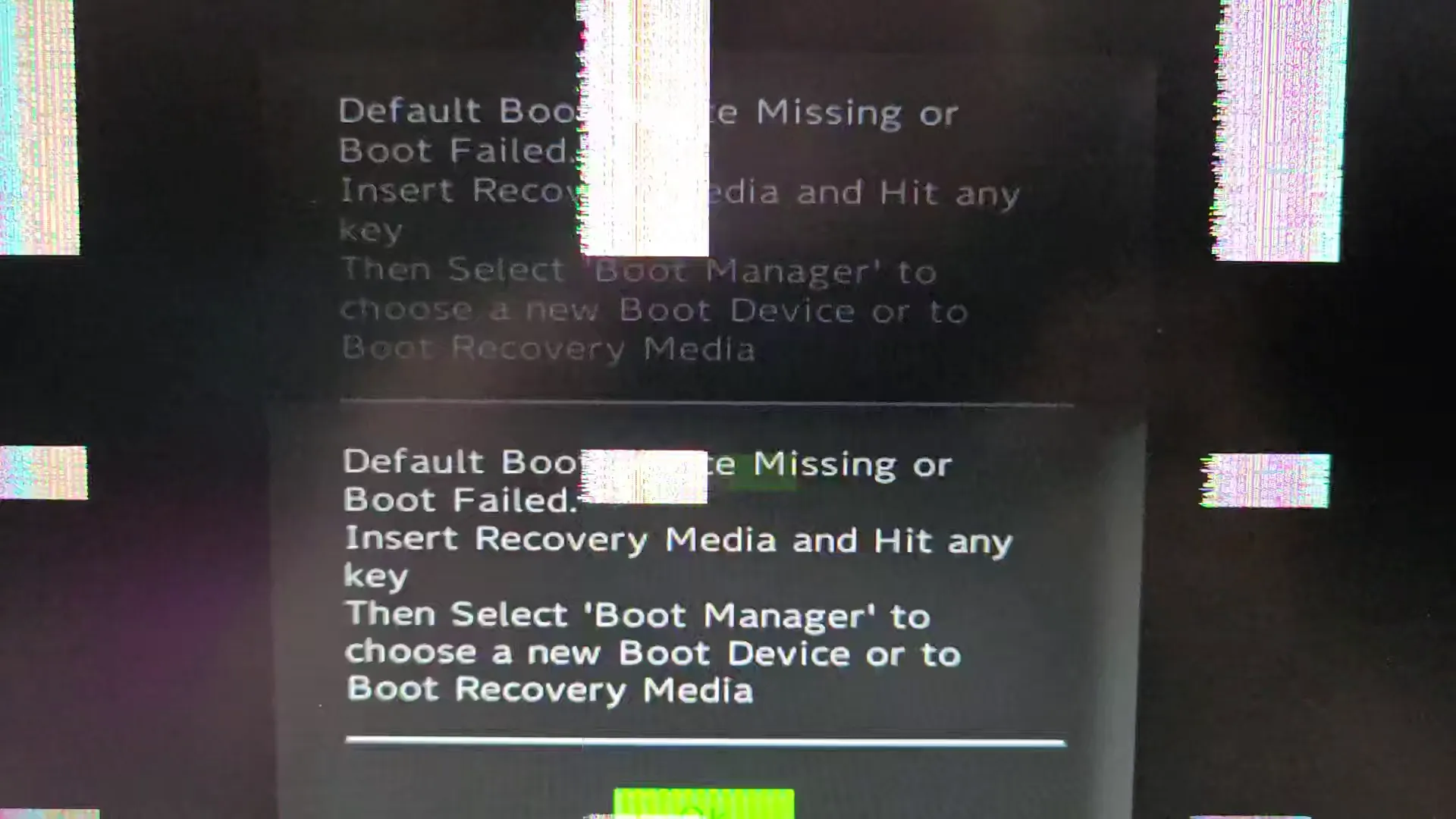 An image of a glitching out boot screen